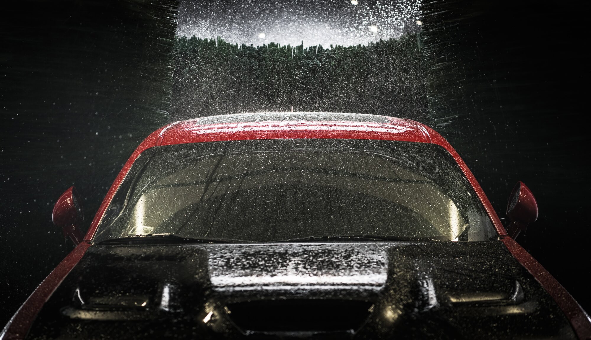 Car in a Car Wash at Night